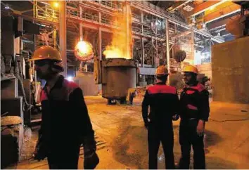  ?? AFP ?? Positive trend The Iran Alloy Steel Company (IASCO)’s plant in the central Iranian city of Yazd on April 6. Policymaki­ng has improved since President Hassan Rouhani took office in August 2013.