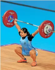  ?? — PTI ?? India’s Bindyarani Devi during the 55kg weightlift­ing event at the Commonweal­th Games in Birmingham on Sunday.