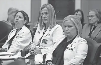  ?? ?? Healthcare workers listen to public comments at Legislativ­e Hall in Dover on March 27.