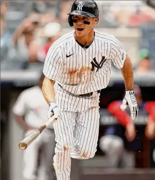  ?? Adam Hunger / Getty Images ?? Bronx-born Andrew Velazquez got his first RBIS in pinstripes with a two-run single off starter Tanner Houck in the second inning of the first game on Tuesday.