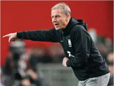  ?? — AFP file photo ?? Klinsmann directs his players during a friendly match between South Korea and Uruguay in Seoul.