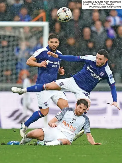  ?? ?? Swansea City’s Joe Allen challenges Ipswich Town’s Conor Chaplin
PICTURE: Jacob King/PA Wire