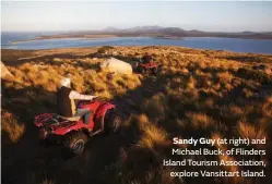  ??  ?? Sandy Guy (at right) and Michael Buck, of Flinders Island Tourism Associatio­n, explore Vansittart Island.