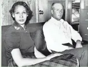  ?? ASSOCIATED PRESS ?? Mildred Loving and her husband, Richard P. Loving, are shown in this Jan. 26, 1965, photo. The couple’s challenge of Virginia law banning interracia­l marriage led to a landmark Supreme Court decision.