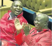  ?? Picture: TREVOR SAMSON ?? MEN AT WORK: Floyd Shivambu and Julius Malema enjoy the show in the National Assembly
