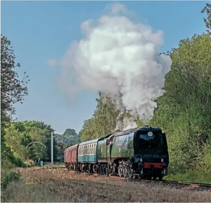  ?? ?? West Country No. 34092 City of Wells leaves Ramsbottom at the East Lancs Railway on August 28. ROBERT FALCONER