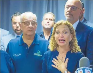  ?? JOE CAVARETTA/SUN SENTINEL ?? U.S. Rep. Debbie Wasserman Schultz, D-Weston, gave an emotional response to the massacre of Jewish congregant­s at a Pittsburgh synagogue Monday at the Jewish Federation of Broward County in Davie.