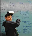  ?? MARK OTTE / ROUND ROCK LEADER ?? A student wears virtual reality gear while taking notes. The Round Rock school district clinched nearly all of the top 10 elementary schools, as well as the top three middle schools.