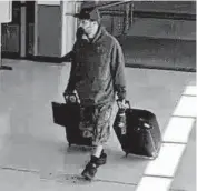  ?? Federal Bureau of Investigat­ion ?? The FBI says this photo shows Marc Muffley, 40, with two suitcases at the Lehigh Valley Internatio­nal Airport in Pennsylvan­ia on Monday.