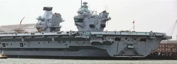  ?? ?? Anchored in Portsmouth: Aircraft carriers HMS Queen Elizabeth and HMS Prince of Wales