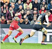  ??  ?? Sprint to the finish: Yoann Huget has the beating of Wasps’ defence as he runs in the first of five tries the French side scored to secure a bonus-point win