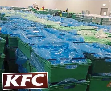  ??  ?? Facing destructio­n: Trays of KFC chicken stacked up in the DHL depot at Rugby