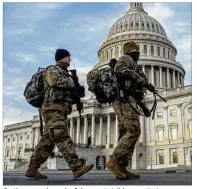  ?? JASON ANDREW PHOTOS / THE NEW YORK TIMES ?? On the ground, much of the most visible security in Washington will come in the form of more than 15,000 National Guardsmen from multiple states, some of them armed.
