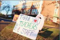  ?? Jarret Liotta / For Hearst Connecticu­t Media ?? A sign sends love out to staff of Middlesex Middle School in Darien, thanks to efforts by students and parents Monday afternoon.