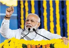  ?? PTI ?? PM Narendra Modi addresses a public meeting at Junagarh, Gujarat, on Thursday