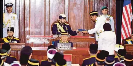  ??  ?? Menteri Besar Datuk Seri Mohamed Khaled Nordin presenting the royal address to Tunku Mahkota Johor Tunku Ismail Sultan Ibrahim at the State Assembly in Bukit Timbalan in Johor Baru yesterday.