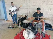  ?? [PHOTO BY KIMBERLY THOMPSON, THE ?? Saturday’s Juneteenth Celebratio­n in Langston included music to entertain visitors.