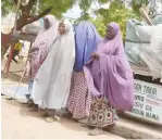  ??  ?? Some beggars along Kwanar Sabo in Kano