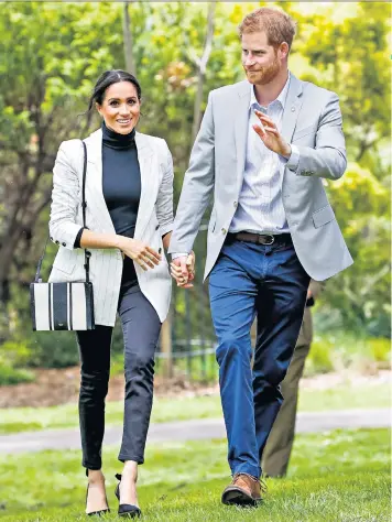  ?? ?? Defence project: Afia’s interview with Amol Rajan, below, suggests the Sussexes are adopting an Americanis­ed approach