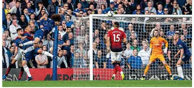  ?? LIAM McAVOY/UK SPORT PICS ?? Bullet: David Luiz heads towards goal to set up Ross Barkley’s equaliser