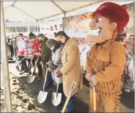  ?? Brian A. Pounds / Hearst Connecticu­t Media ?? From left, student-athletes, Sacred Heart University President John Petillo and benefactor­s Marisa and Frank Martire break ground on the new hockey arena Monday on the West Campus in Fairfield.