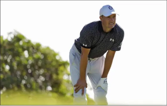  ?? MATT YORK — THE ASSOCIATED PRESS ?? Jordan Spieth watches his shot from the 17th tee during the first round of the Sony Open on Thursday at Waialae Country Club in Honolulu.