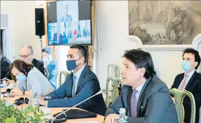  ?? HA / EFE ?? Giuseppe Conte, en una foto oficial durante su videoconfe­rencia con las cabezas de la UE y el FMI