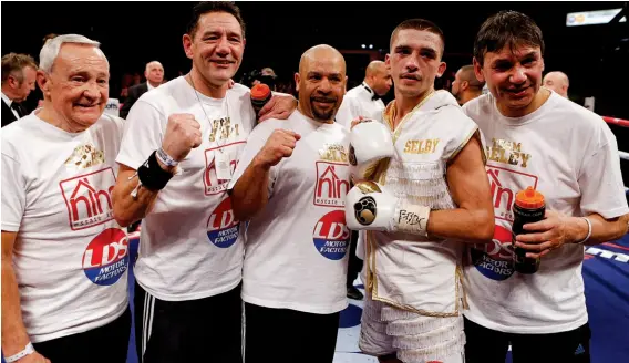  ??  ?? TEAMWORK: Many of Borg’s [centre] fighters, such as Lee Selby, are managed by Sanigar [far right]