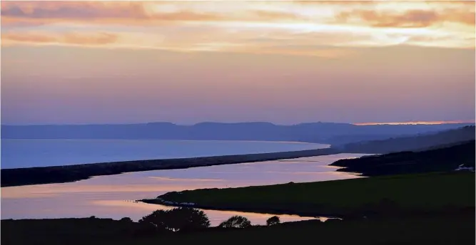  ??  ?? Sunset from Moonfleet Manor, main; the view from Corfe Castle, renamed Kirrin Castle in Enid Blyton’s Famous Five adventures, below