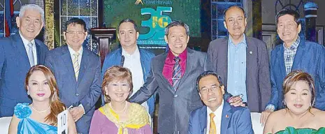  ??  ?? Ramon F. Garcia (standing, fourth from left) with his business partners and clients from Pillars 5, Inc.: Karla De Jesus De Pala, SEC Commission­er Antonietta Ibe, Arnulfo Villafuert­e De Pala, Jaime Garcia Fabregas, Andrew Trogen, Consuelo Centenera Bichara, Carlos Eduardo Caballero Fabregas, and Pamela Paz Llana