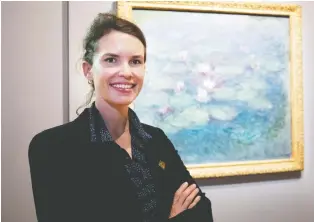  ??  ?? “We wanted to tell a story that would be relevant to what we’re living now,” says co-curator Mary-dailey Desmarais, with a work from Claude Monet’s Water Lilies series. “I hope it brings people some joy in these difficult times.”