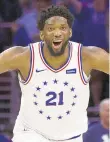  ?? MITCHELL LEFF/GETTY ?? The 76ers, led by All-Star Joel Embiid, are scheduled to play on national TV 24 times this season.