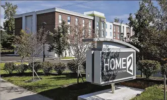  ?? TY GREENLEES / STAFF ?? First proposed in 2016, the Home2 Suites by Hilton encountere­d opposition from neighbors worried about noise, traffic and blocked views. The hotel is now open, joining several other businesses that have taken up residence in the area.