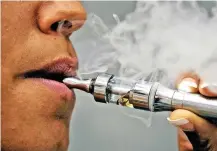  ??  ?? DEFEATS THE OBJECT: Scientists behind the latest research warn that government endorsemen­t of e-cigarettes could ‘worsen the tobacco epidemic’.