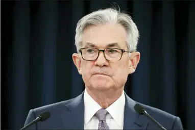  ?? JACQUELYN MARTIN — THE ASSOCIATED PRESS FILE ?? In this March 3, 2020file photo, Federal Reserve Chair Jerome Powell pauses during a news conference in Washington. Powell provided a bleak outlook for the U.S. economy in remarks Wednesday, May 13, and urged Congress and the White House to act further to offset the damage from the viral outbreak.