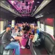  ?? Steve Baldwin / Contribute­d photo ?? ⏩ At left, Brookfield girls tennis takes a party bus to its Class M state tournament match at Stonington last May.