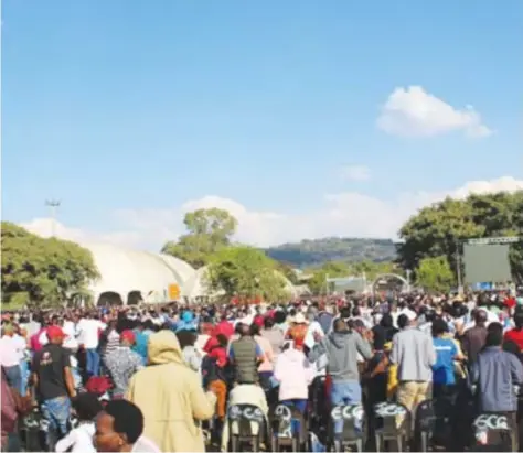  ?? — (Picture by Saprin Koti) ?? A bumper crowd of 65 000 that thronged the Showground­s in Pretoria for last Sunday's church service.