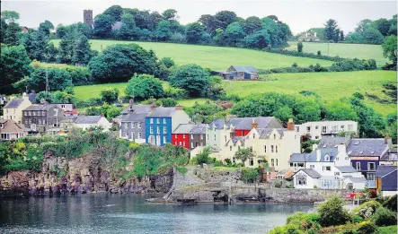  ?? — PAT O’CONNOR ?? Ireland’s legendary green countrysid­e is the backdrop for the coastal town of Kinsale, a winner in the annual Tidy Towns contest, which looks to award the best-kept villages in the country.