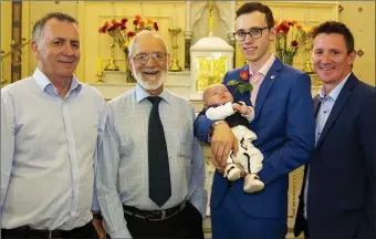  ??  ?? Five generation­s of the O’Leary family at Rathgarogu­e church, James (great grandfathe­r) Paddy (great great grandfathe­r) baby Ronan, Clayton (dad) and Colm (grandfathe­r). RIGHT: Andrea and Clayton O’Leary on their wedding day.