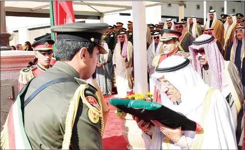  ?? KUNA photo ?? HH the Amir of Kuwait during the flag hoisting ceremony at the Bayan Palace.