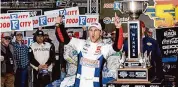  ?? Wade Payne/Associated Press ?? Denny Hamlin celebrates winning a NASCAR Cup Series auto race Sunday in Bristol, Tenn.