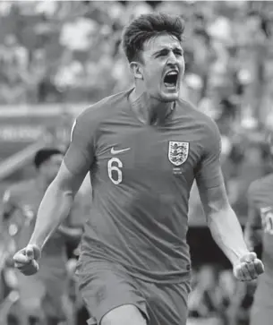  ?? Francisco Seco, The Associated Press ?? Harry Maguire celebrates after scoring England’s opening goal Saturday during its World Cup quarterfin­al match against Sweden at Samara Arena, in Samara, Russia.