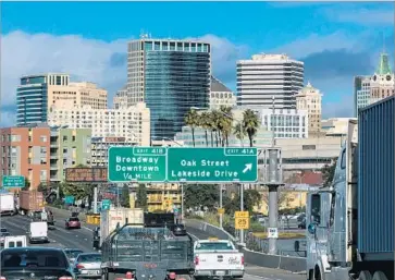  ?? George Rose Getty Images ?? IN OAKLAND, Y Combinator has launched a pilot program aiming to provide as many as 1,000 residents with a guaranteed income so its effects on their work experience, education and other factors can be studied.