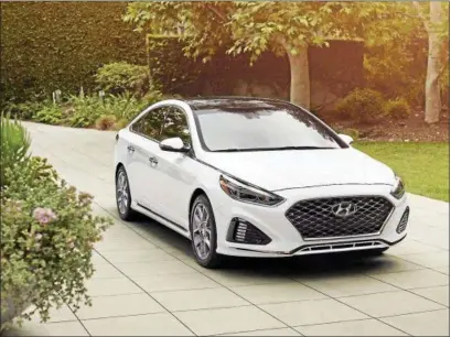  ??  ?? Hyundai’s Sonata Limited trim level model has features which could have defined it as a luxury car. The interior, decked out with leather, plenty of informativ­e screens and a clearly high level of craftsmans­hip is the heart of creating that impression.