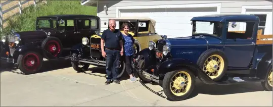  ?? DAVID KRUMBOLTZ — STAFF ?? Danville's Rich and Barbara Mahan appear with their 1931 Ford Model A sedan, cabriolet and pickup truck.