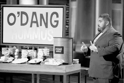  ?? TYLER GOLDEN/ABC ?? UCF grad Jesse Wolfe shows off his O’Dang Hummus on “Shark Tank” in 2015. His hummus salad dressings are now sold in 2,000 Walmart stores.