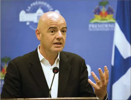  ?? AP PHOTO ?? In this April 29 file photo, FIFA President Gianni Infantino gives a press conference at the NationalPa­lace in Port-au-Prince, Haiti.