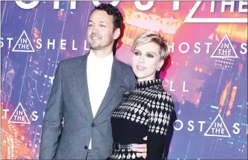  ??  ?? Sanders and Johansson pose as they arrive at the premiere of ‘Ghost in the Shell’ in Paris, France, on Tuesday. — Reuters file photo