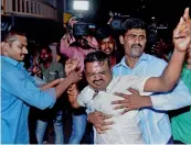  ??  ?? A supporter of TTV Dhinakaran tries to set himself on fire as Delhi cops arrive to issue a lookout notice against the AIADMK leader in Chennai on Wednesday. — PTI