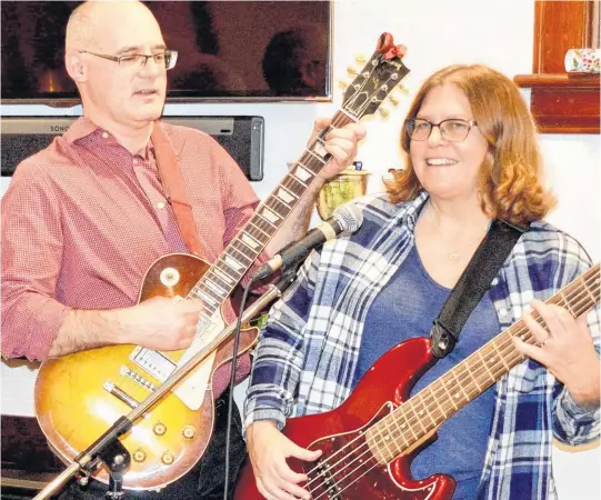  ?? ELIZABETH PATTERSON • CAPE BRETON POST ?? Dr. Tom Hewlett and Dr. Susan Ritcey are two Cape Breton doctors who enjoy performing music.